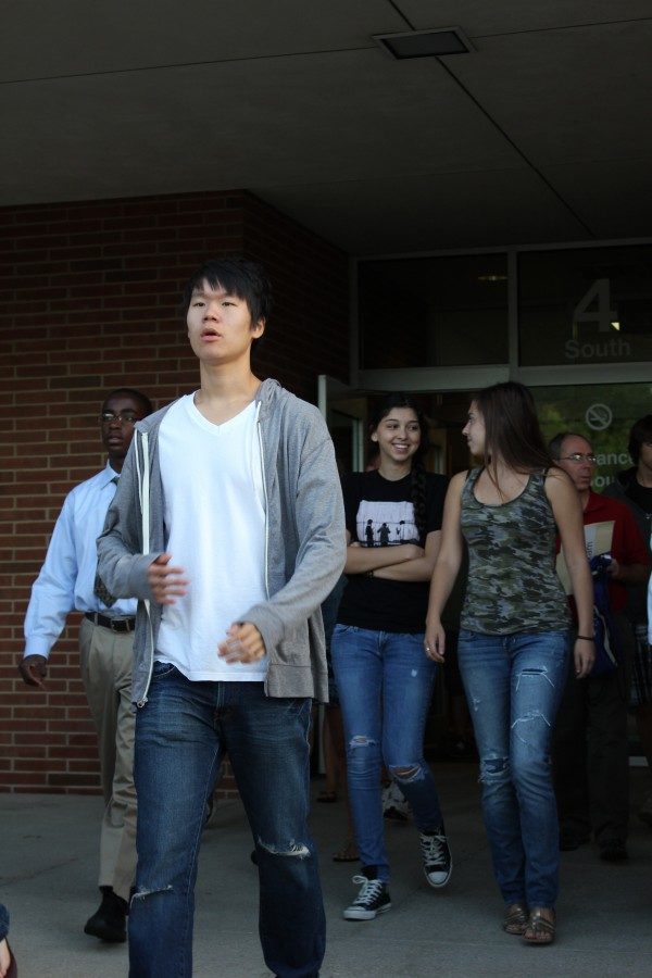 Students exit the building during a fire drill on Aug. 30. Indiana requires schools to have at least one tornado drill and one man-made occurrence drill per semester in addition to five fire drills during the school year. HENRY ZHU / PHOTO