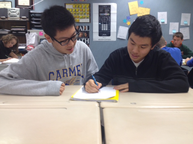 Sophomore Class officers Joseph Lee (left) and David Liang (right) discuss future plans to meet for next semester. The Sophomore Class officers have not met since Homecoming. DHRUTI PATEL / PHOTO ILLUSTRATION