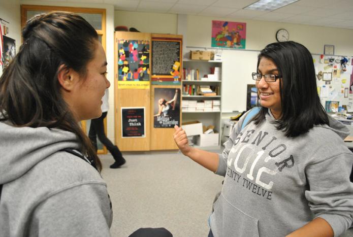 GOING TO GIVE: Aghilah Nadaraj, vice president of Students for Education and senior, explains the club’s next fundraiser. Nadaraj said the club introduced a new event this year in order to encourage more members to participate. HENRY ZHU / PHOTO