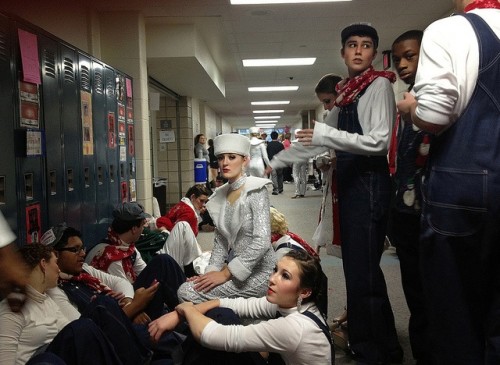 Choir students rest and prepare in a hallway near the stage during their latest production, Holiday Spectacular. Being a part of the show helped sophomore Michael Mykyta gain experience that will help his auditions for Les Misérables, beginning on Jan. 30. CONNER GORDON / PHOTO