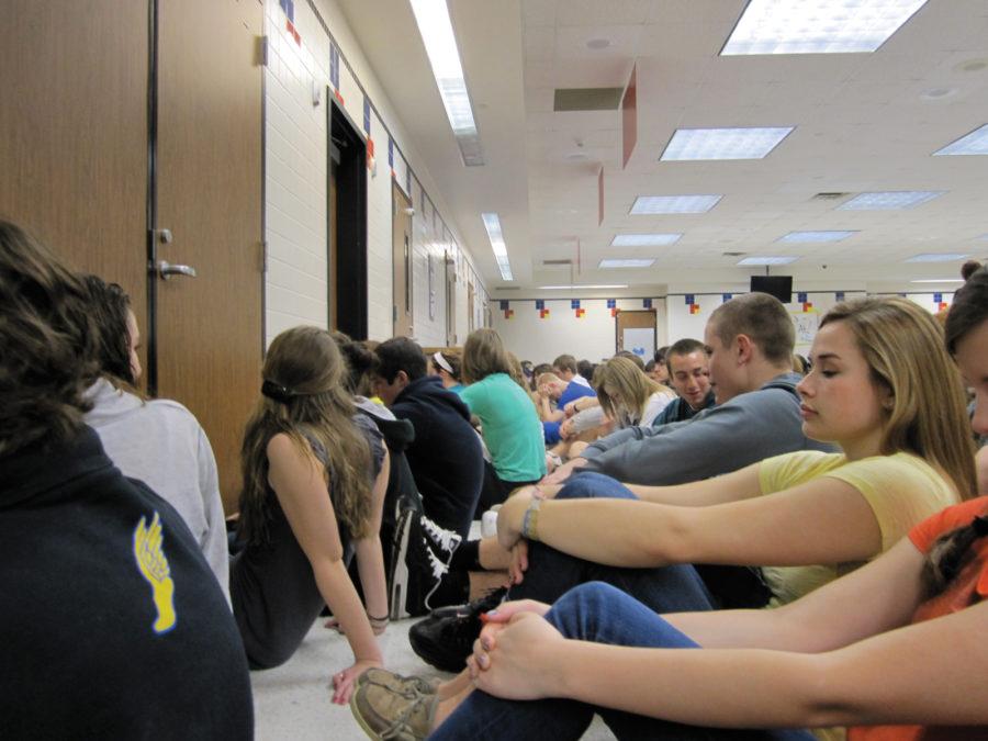 take cover: Students take precautions during the tornado on March 2. Williams said administration has determined the first floor as the safest floor. Kathleen Bertsch / Photo