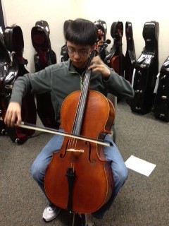 Brandon Xu, orchestra member and sophomore, practices for the ISSMA state competition. According to Xu, the California trip was a good opportunity to practice the pieces for the upcoming ISSMA competition. RYAN ZUKERMAN / PHOTO