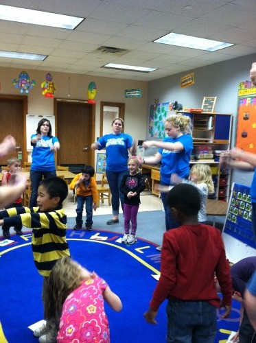 Kids’ Corner seniors play a game of car-themed Simon Says to match the theme of the week, “A Zoomin’ Good Time.” According to Kids’ Corner teacher Kimberly Lenzo, March 26 was the first day for this group of seniors to be teaching the preschool class. OLIVIA WEPRICH/PHOTO