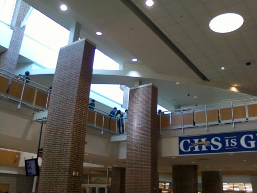 During passing period, students traverse the catwalk, which is often used as a viewing location during events in the commons, like the BucketBangers performance on Sept. 21. The administration is looking to possibly reinforce the handrails preemptively for fears of the structure falling as more students lean on it. 