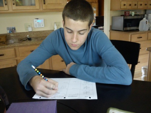 Freshman Graham Fugate begins his Algebra I homework. Like many freshmen, he is deciding to take Geometry following Algebra I. MATT BARNTHOUSE / PHOTO