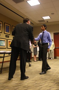 Harsha Vemuri, National Merit Semi Finalist and senior, is recognized for his achievement at the Oct. 23 school board meeting. The school board acknowledged many award winners at this meeting. MAIER / PHOTO 