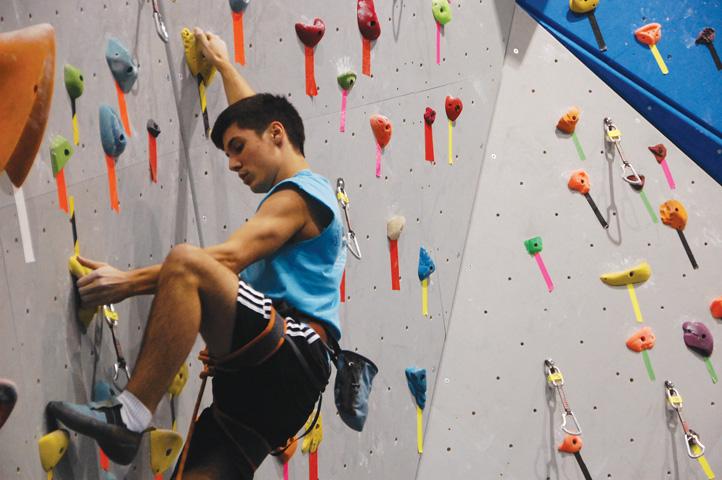 Senior Axel Masquelin is an indoor and outdoor rock climber