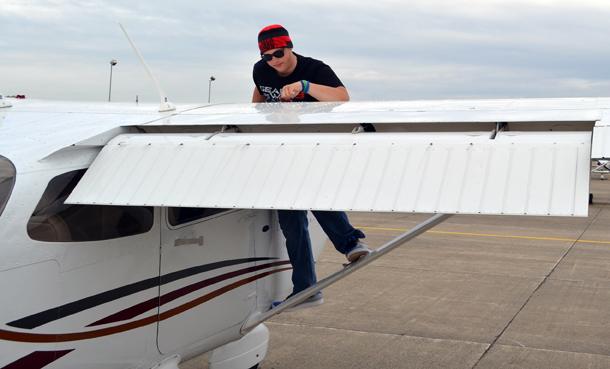 HIGH FLYER: John Lawless boards his aircraft at the Indianapolis Metropolitan Airport. JOHN LAWLESS / SUBMITTED PHOTO