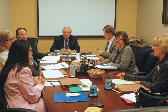 knowledge is power: Superintendent Jeff Swensson (third from right) attends a Carmel Clay Schools (CCS) board meeting in January. Swensson is trying to pass legislation for CCS to become a “high performing school district,” which will give CCS more autonomy. AMIRA MALCOM / PHOTO