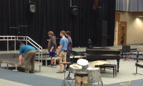 Students move stage pieces into place in preparation for Jazz a la Mode. All four bands will play at the concert from April 18 to 20. According to Mike Pote, director of Jazz Band I, Jazz a la Mode is the bands last major concert. LAUREN LU / PHOTO
