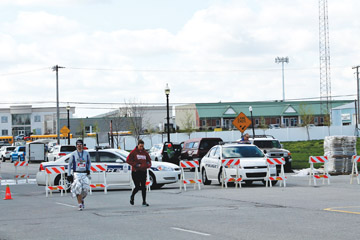 Police surround the Carmel Marathon on April 20. Senior Cecilia Bouaichi, who was at the location of the bombs minutes before the explosions, said she expects more security at future marathons such as the May 4 Indy 500 Festival Mini-Marathon.
CRYSTAL CHEN / PHOTO