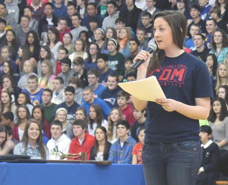 Speaker of the House Meredith Baranowski speaks at an all-school convocation. Baranowski , one of this schools female leaders , said she believes men and women are equally capable of leadership.