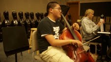 Yi Cui, Philharmonic Orchestra cello player and sophomore, practices his cello during SRT. The Philharmonic and Symphony Orchestras are the two orchestras participating in the ISSMA Regionals at Pike High School on April 24. MATTHEW DEL BUSTO / PHOTO