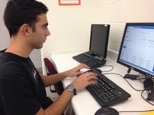 Student Body President George Gemelas works on a computer to prepare issues to discuss with the administration. Gemelas said he hopes that senior attendance will improve this year on PSAT day, but is doubtful. HUANG/PHOTO