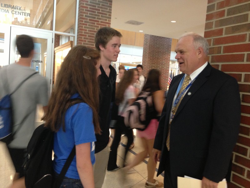 Principal John Williams talks to students in the hallway during passing period. Williams said that the administration is going to advertise the AP Capstone Program in the upcoming months. CLAUDIA HUANG / PHOTO