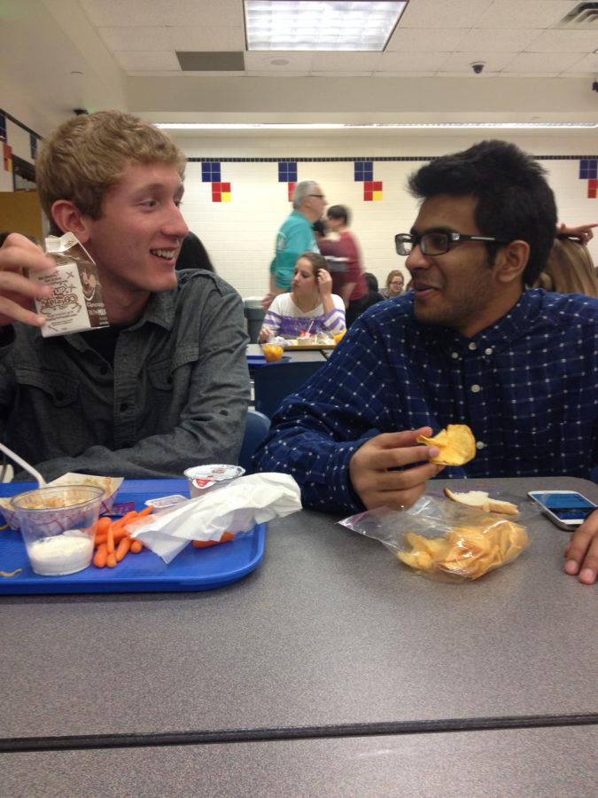 Senior Sami Uzzama talks to a friend during lunch. Uzzama said that he would prefer taking a traditional summer physical education class over an online class because it is more social and engaging. ANDREW WANG / PHOTO