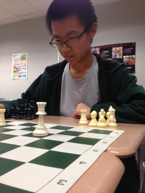Freshman+Eric+Zhu+ponders+his+next+move.+%E2%80%9CIt%E2%80%99s+really+enjoyable+to+just+play+and+improve+in+chess%2C%E2%80%9D+he+said.