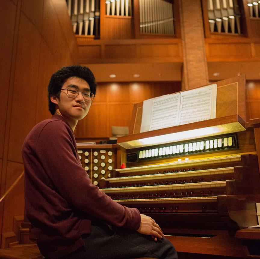 THE KING OF INSTRUMENTS: Junior Joseph Huang plays the pipe organ