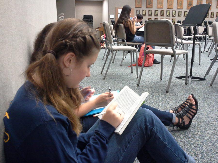 Grace Miller, vice president and junior, works on her homework during SRT. Miller said that next meeting the club plans to announce the treasurer and brainstorm ways to fundraise.