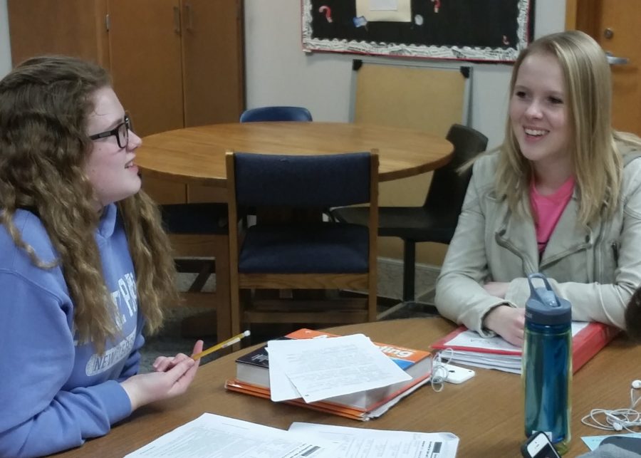 Kelin Murphy (right), sophomore and FCCLA district president, and Vivian Heerens, club president and senior, plan the Valentine’s Day Dinner. “This event is important for us to raise money so we can send our members to the state meeting,” Heerens said. GRANT SMITH / PHOTO