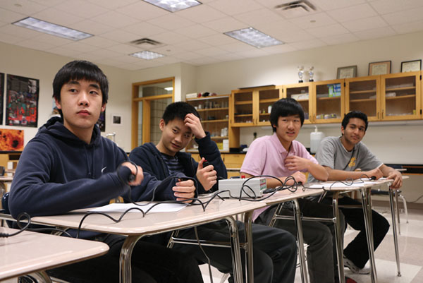 Science Bowl participants practice during a club meeting. According to Joshua Segaran, Science Bowl founder, officer and senior, officers will organize and volunteer at the invitational. LIU/PHOTO