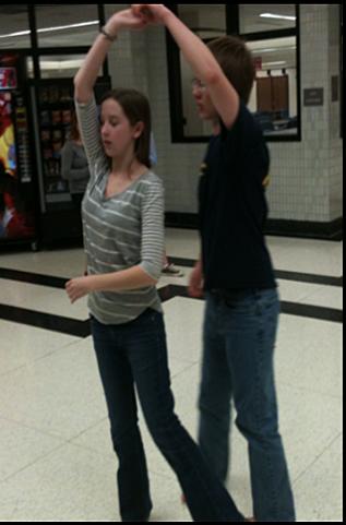 Members and juniors Catherine Meador and Aaron Ryker practice steps they learned last meeting. The Swing Club will be learning the Lindy Hop during their next meeting on Feb. 2 outside of the main cafeteria from 3:30 to 4:30 p.m. SITHA VALLABHANENI / PHOTO