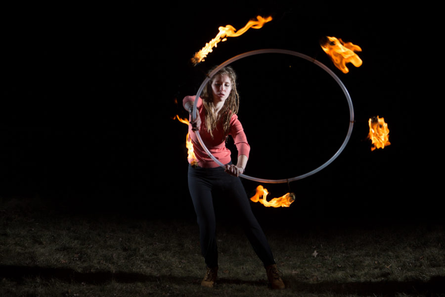THE GIRL ON FIRE: Junior Amy Hanners performs flaming stunts