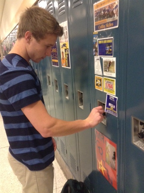 Collin Skiles, student teacher of Kids’ Corner and senior, opens his locker. Skiles said he is looking forward to being at his placement at Smoky Row. CYNTHIA YUE / PHOTO