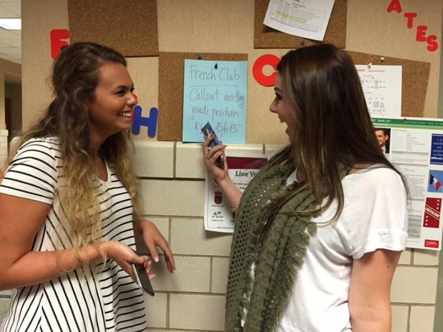 Natalie Tanchon (right), Interact Club member and junior, has a conversation with senior Gabby Perelmuter. She said members should look forward to the reopening of Rotary Interact Club. JASMINELAM/ PHOTO
