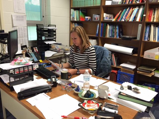 Michelle Foutz, Economics Club sponsor and economics teacher, sits at her desk, checking her email. She said her hopes for the club include going to New York and going to the national competition.
ELLEN PENG / PHOTO