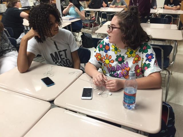 While attending a GSA meeting, Abbey Wiggam and Hallie Watson discuss new things they can do to participate in the club this year. The next club meeting will be on Sept 23 in B202. MANAHIL NADEEM / PHOTO