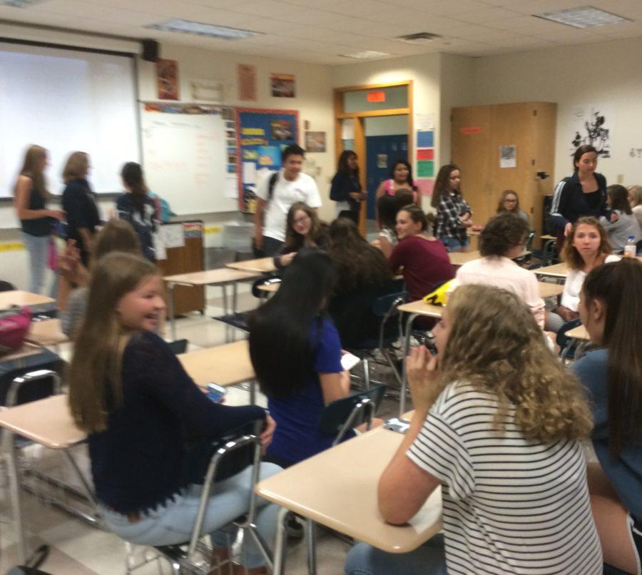 Spanish club members chat as the first meeting of the year begins. The call-out meeting was held Aug. 24 in Room B201. SABRINA MI / PHOTO