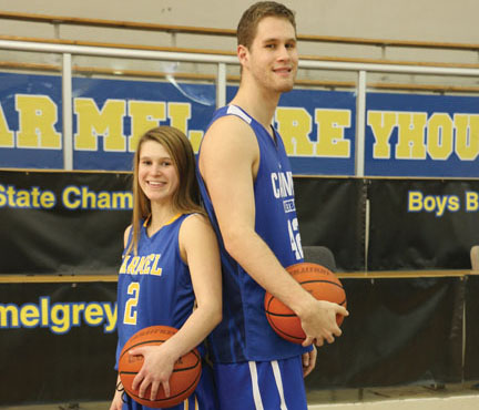 SAME SPORT, DIFFERENT BODY:
Women’s varsity basketball player and junior Olivia Christy stands back to back with men’s varsity basketball player and senior Trenton Richardson. Although Christy is only 5’5” while Richardson stands at 6’8”, they are both able to play on the varsity team of a sport which stereotypically favors tall athletes. 
ALLY RUSSELL / PHOTO