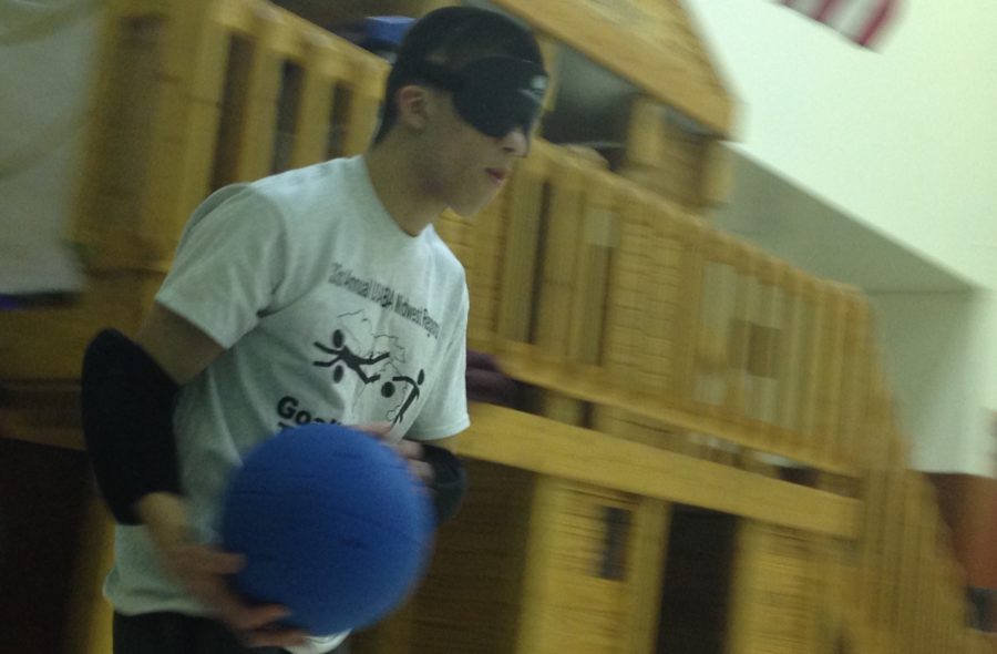 Chris+Avilla%2C+member+of+the+Goalball+team+at+the+Indiana+School+for+the+Blind+and+Visually+Impaired+%28ISBVI%29%2C+is+preparing+to+launch+the+ball+into+the+opponent%E2%80%99s+goal.+The+CHS+Goalball+Club+travels+to+ISBVI+every+Thursday+night+to+practice%2C+judge+and+even+help+coach+the+Goalball+team+at+ISBVI.+CHRISTINA+YANG%2F%2FPHOTO