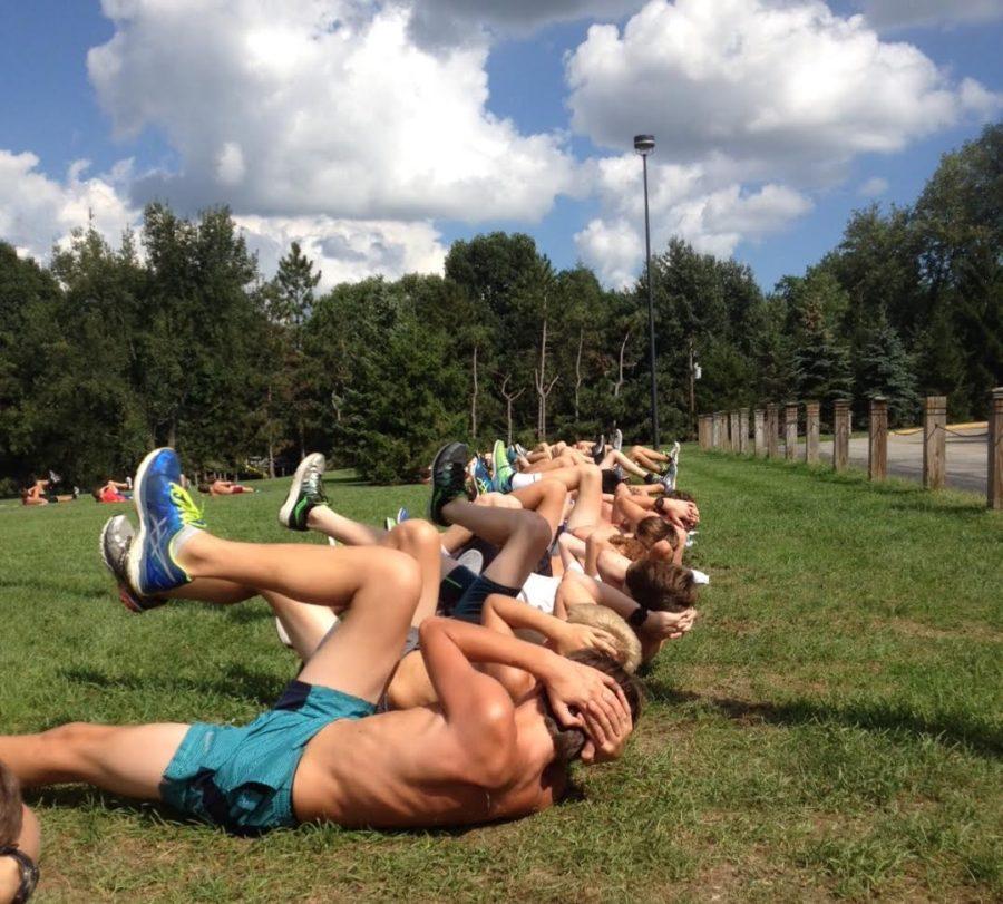 Along with running everyday, the mens cross country team has to do core exercises. 
