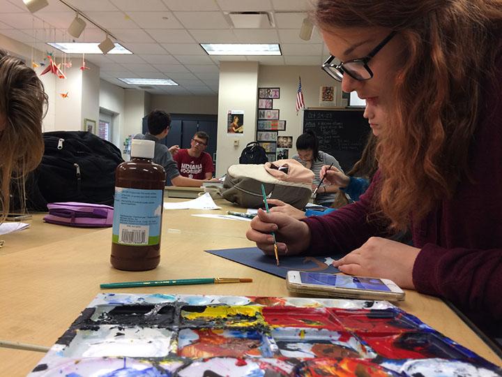 Hannah Kosc, Art Club member and sophomore, works on an art piece during an Art Club meeting. At this meeting, Art Club sponsor Jennifer Bubp discussed information to join CHS’s new National Art Honor Society. Art students and Art Club members were able to fill out an application including a portfolio and teacher recommendations to join NAHS, which will be starting out with an induction ceremony on Jan. 19.
