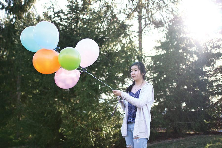REMEMBERING THE PAST:
Junior Joanna Zhang reminisces her past experiences at the circus with balloons reminding her of her childhood trip. Zhang said while there is some awareness of animal cruelty in the entertainment industry, there is not enough.