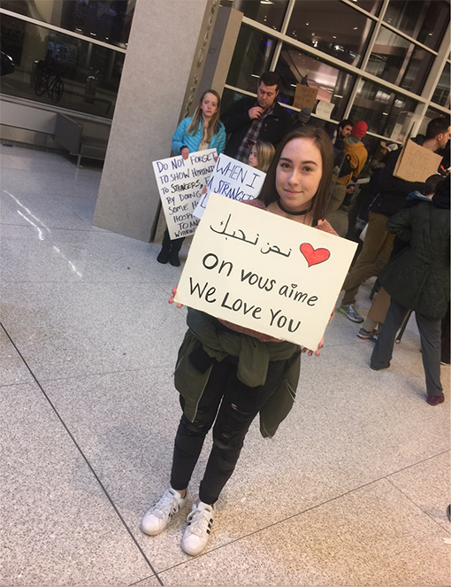 On Jan. 29, junior Alexis O’Brien went to a Trump protest at the Indianapolis International Airport to protest against the president’s executive order to temporarily ban immigrants from seven predominantly Muslim countries. O’Brien made a sign saying “We Love You,” in Arabic, French and English. She said that she doesn’t support Trump’s order because not all immigrants are terrorists and because the issue blocked some Americans who were returning back to the US from one of those countries.