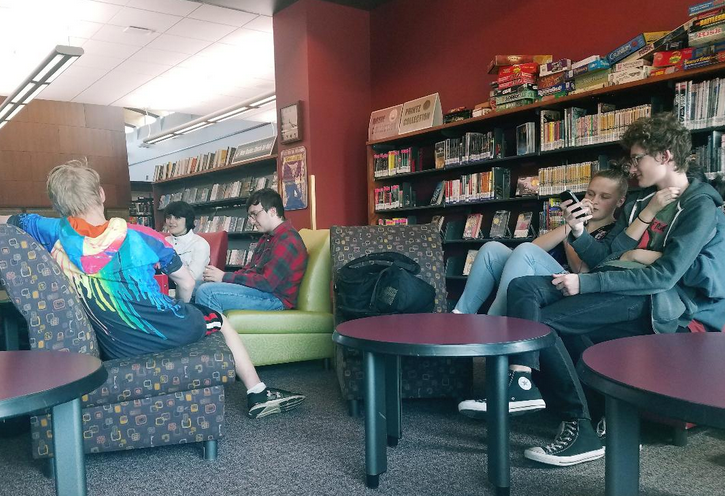 CHS students study and hang out in the Young Adult section of the library. The library offers many resources for students looking to study or just relax after school.