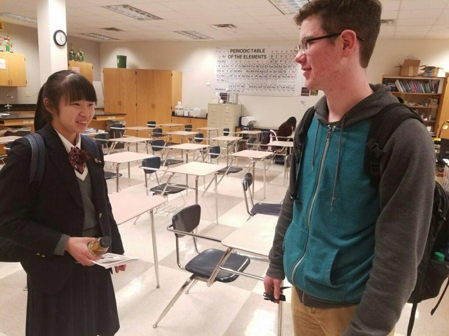Japanese Student Hitomi Morikata meets with Sophomore Evan Kenyon during class. The exchange students follow their hosts around during the school day.