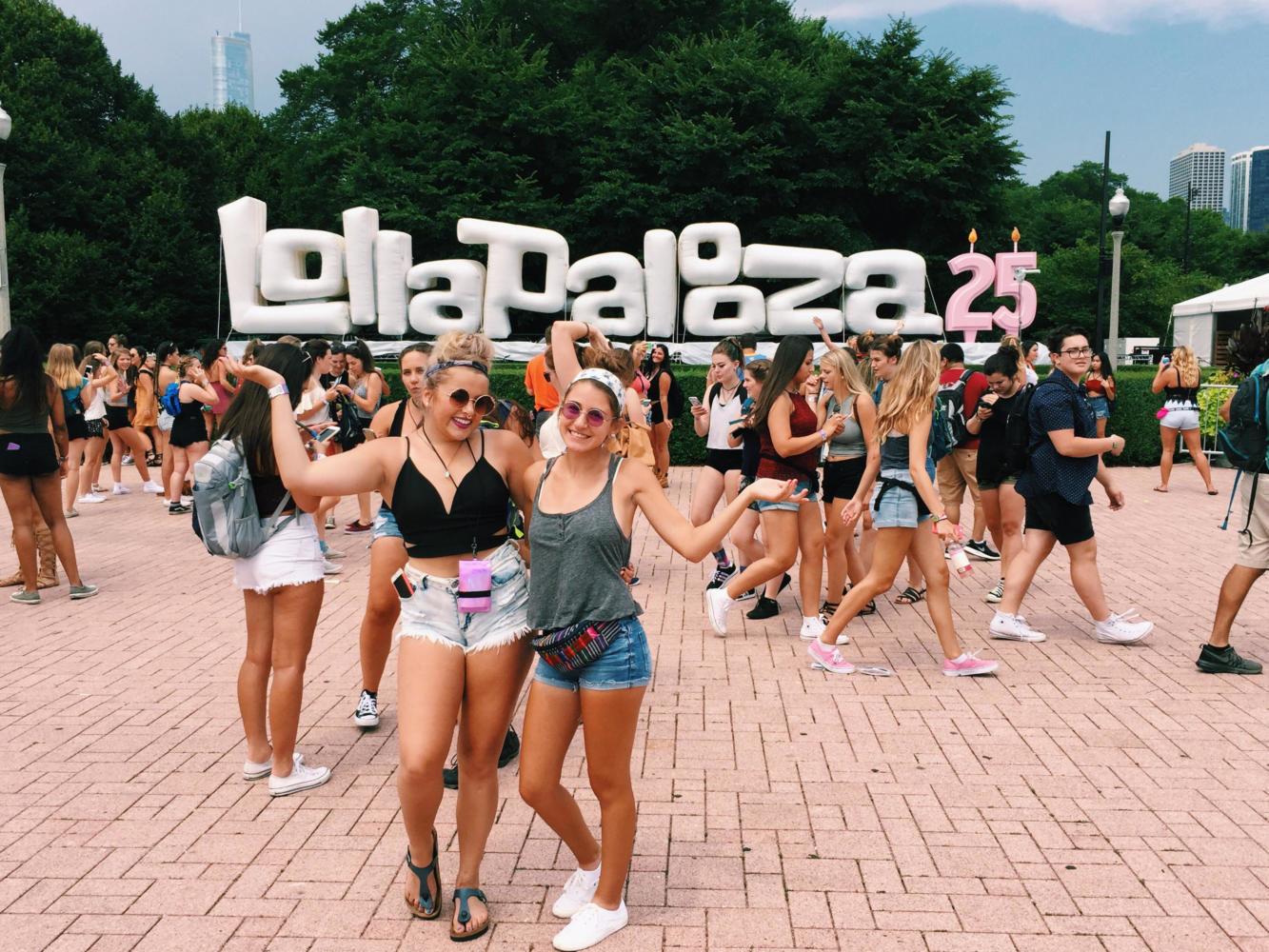 Seniors Kathryn Scott and Francesca Smith pose for a photo at the 2016 Lollapalooza festival. Scott said the festival was expensive but she made revenue by selling extra tickets.
