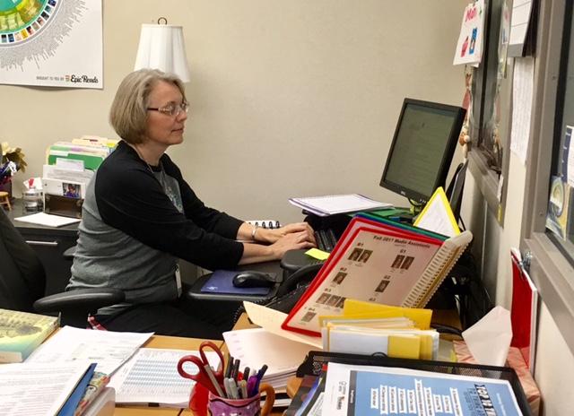 Terri Ramos, department chair for media and communications, works on her computer. She is sending off emails to other faculty members. My primary goal is always to give the kids the knowledge they need and to support the teaching that goes on in this school, Ramos said.​
