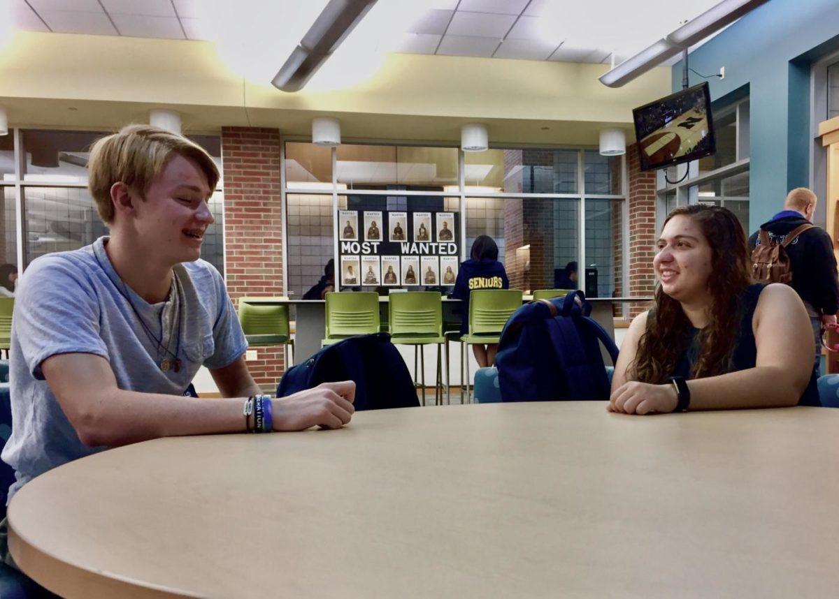 Sophia Tragesser, Teens for Life president and senior, and Michael Greener, Teens for Life treasurer and junior, meet in the library to discuss future club plans. The club has not found a sponsor yet, and the members have scheduled meeting with possible sponsors throughout the week.
​