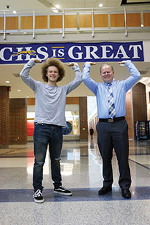 Both sophomore Connor Inskeep and Mr. Inskeep show their Greyhound spirit. Connor said he tries not to bring up the fact that he is Mr. Inskeeps son since he understands that there could be potential bias.