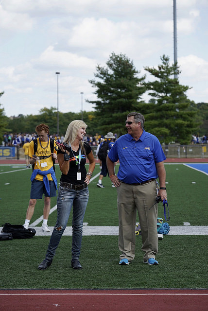 Principal Tom Harmas talks to Assistant Principal Amy Skeens-Benton at the homecoming pep session. Harmas plans to implement a new remediation program.    