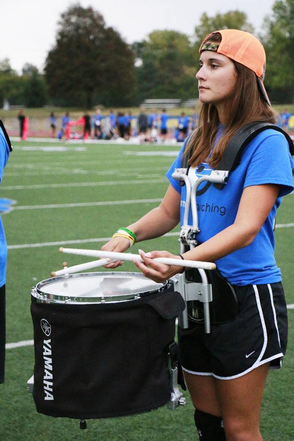 TCP Senior Syd Holtzapple practice after school with the marching band. Holtzapple said her extracurriculars often conflict with her schedule and make it difficult to become accustomed to her new symposium schedule.