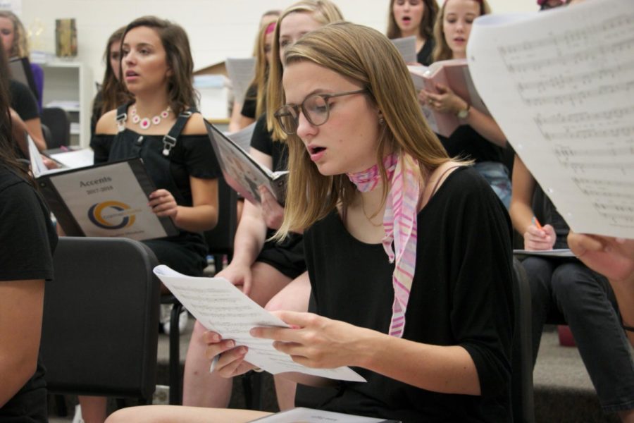 Senior Anna Fagin reads music for her Cabaret performance. Fagin auditioned with Accents Alyssa Easton and Cory Steele for a spot in the show on Oct. 21.