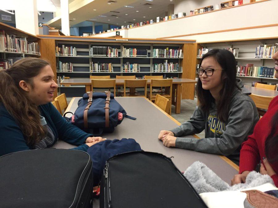 Sophia Tragesser, Teens for Life club president and senior, talks to her classmate about possible sponsors for the club. Tragesser said the club will continue to focus on finding a sponsor for this year.