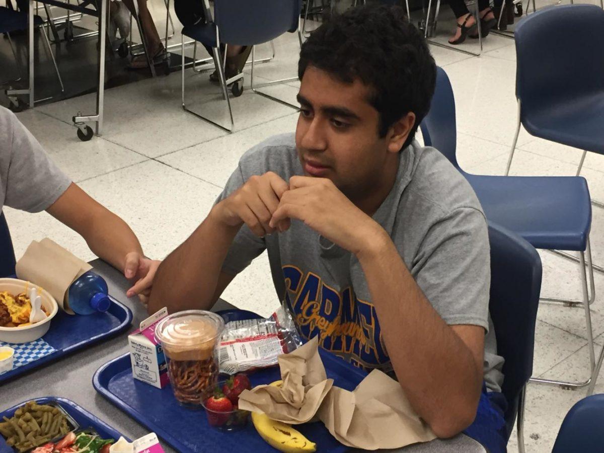 Senior Ian Samir eats lunch with his friends. “Im really thankful intramurals exists. Otherwise, I wouldnt be able to play that much basketball,” Samir said.