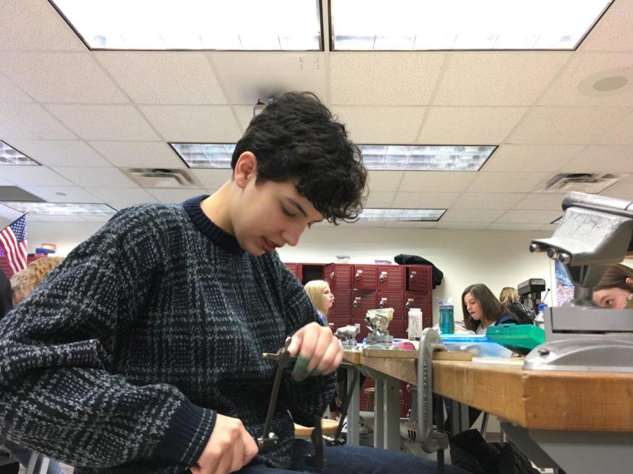 Mackenzie Gonzalez, senior and lead actress in “Up the Down Staircase,” works to create a piece of jewelry during class. Gonzalez said rehearsing for the fall production has not created any serious conflicts in her schedule, and she is still able to take on projects such as the one pictured.